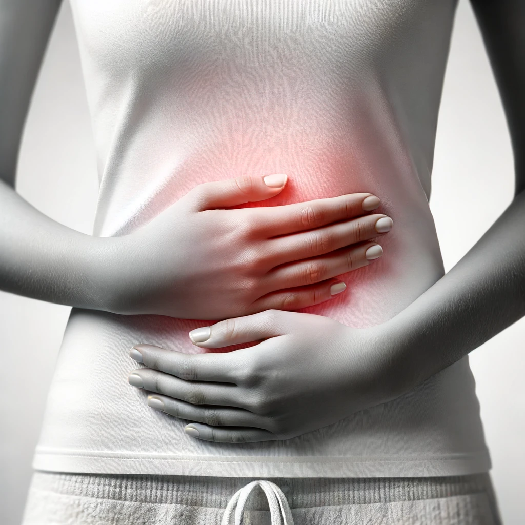 Woman with hand on stomach form gastrointestinal symptoms. 